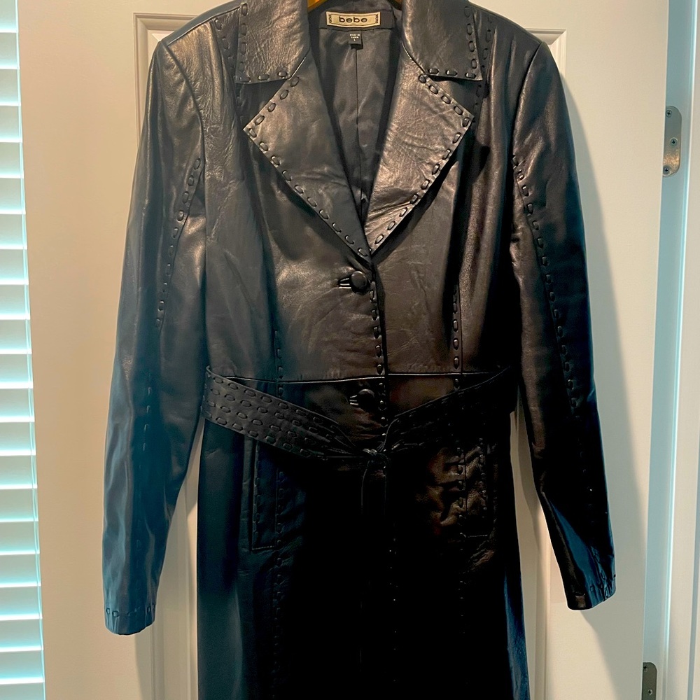 Bebe brand. Black mid thigh length super soft leather jacket